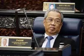 Malaysian PM warns against heave as record virus case number reported