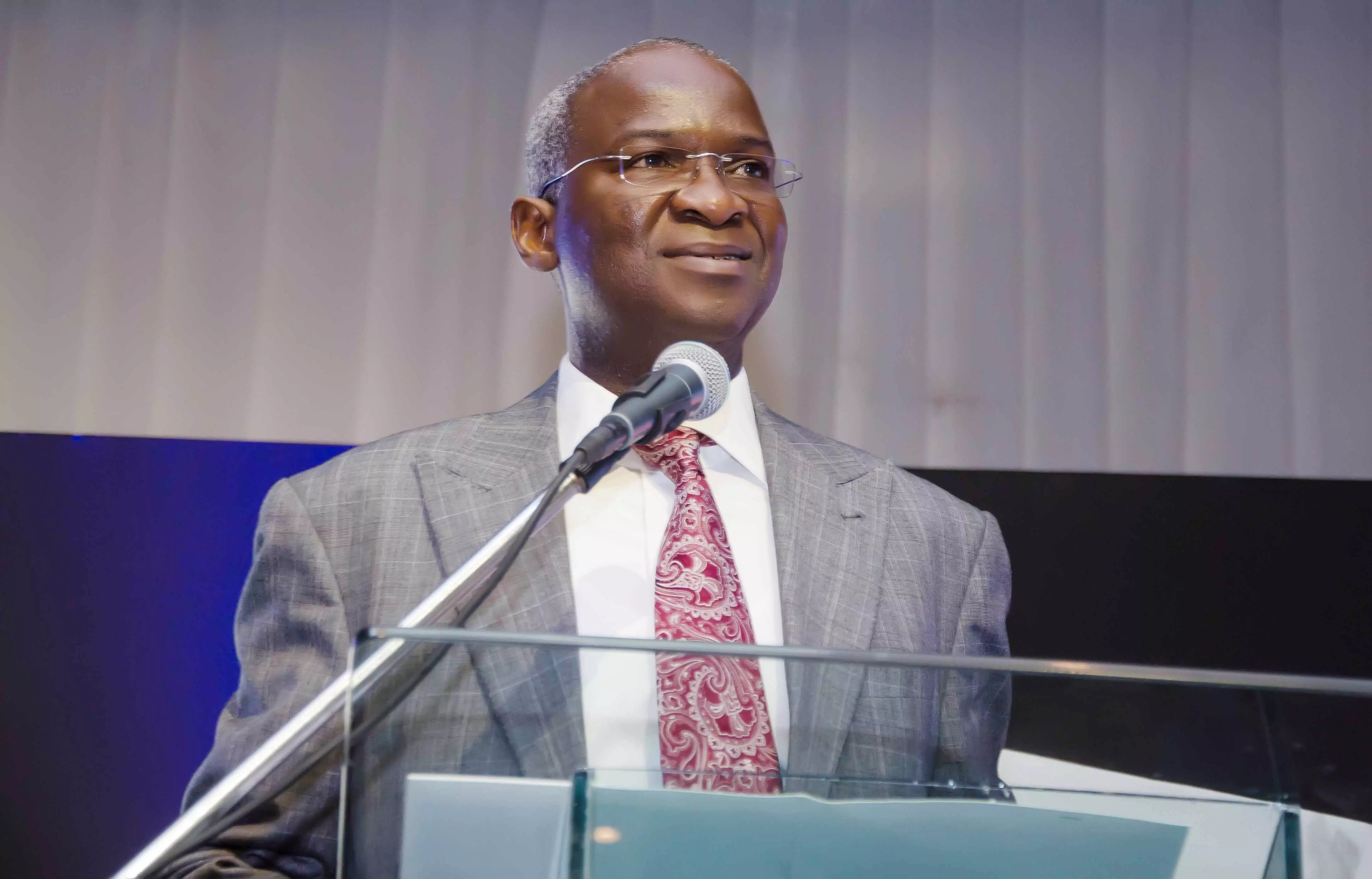 Fashola assess damages, gives traders along Airport Road Flyover two weeks vacation order